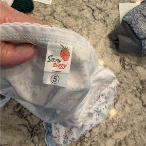 Strawberry brand 2 girls size 5 tshirt  one yellow floral, one lavender floral